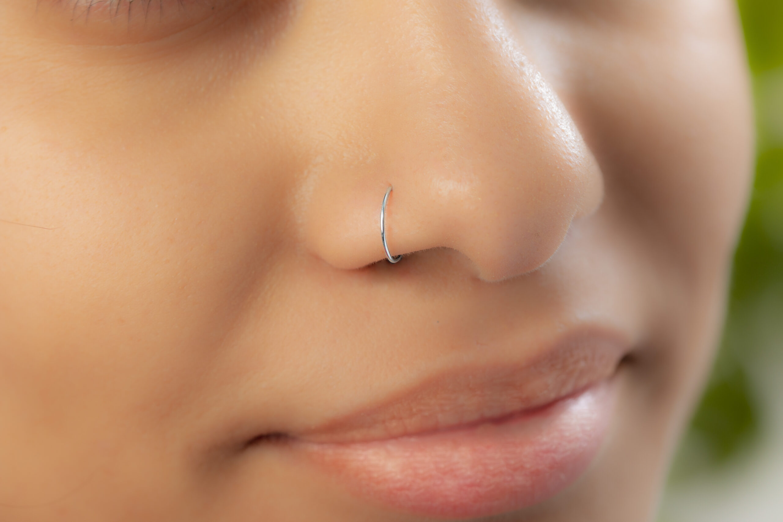 Fake nose piercing with eleven crystals