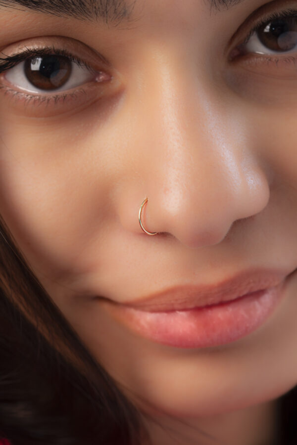 model with fake nose ring